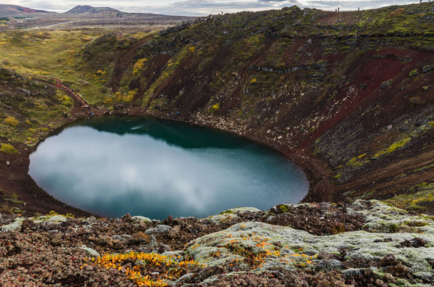 Kerid Crater Lake, formed from an inactive volcano, can be found off the Golden Circle Iceland - Fotoğraf, Görsel