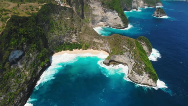 Kelingking beach and blue ocean in Nusa Penida. Aerial view - Footage, Video