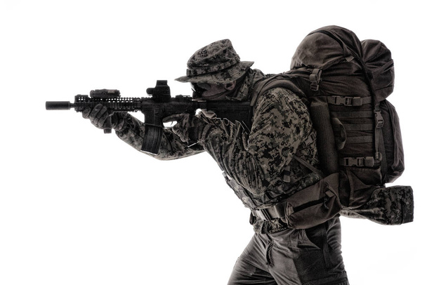 Army infantryman aiming service rifle studio shoot - Photo, Image