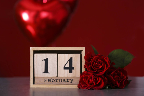 St. Valentines day composition with the bouquet of roses and other romantic mood attributes. - Photo, Image