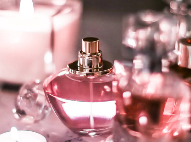 Perfume bottle and vintage fragrance on glamour vanity table at  - Photo, Image