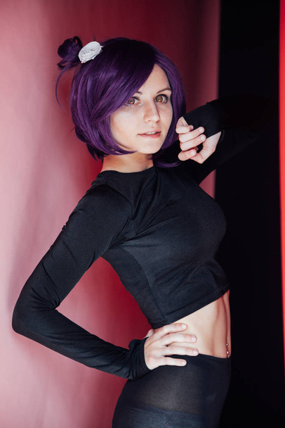 Beautiful woman anime cosplayer with purple hair Japan - Zdjęcie, obraz