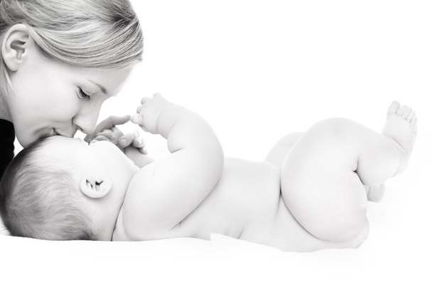 Happy mother kissing baby - Zdjęcie, obraz