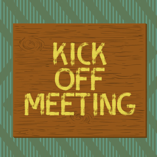 Text sign showing Kick Off Meeting. Conceptual photo getting fired from your team private talking about company Square rectangle unreal cartoon wood wooden nailed stuck on coloured wall. - 写真・画像