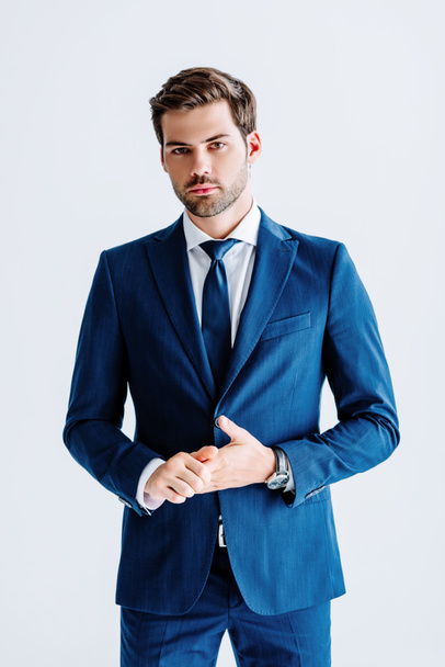 handsome businessman in blue suit looking at camera isolated on white - Φωτογραφία, εικόνα