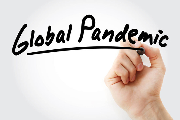 Hand writing Global pandemic with marker - Фото, зображення