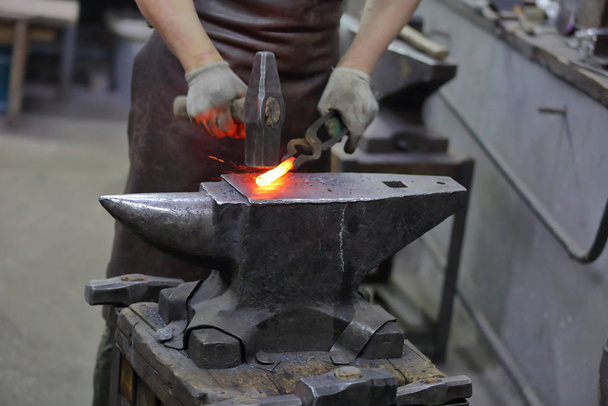 The process of manufacturing a craft product in a forge - Photo, Image