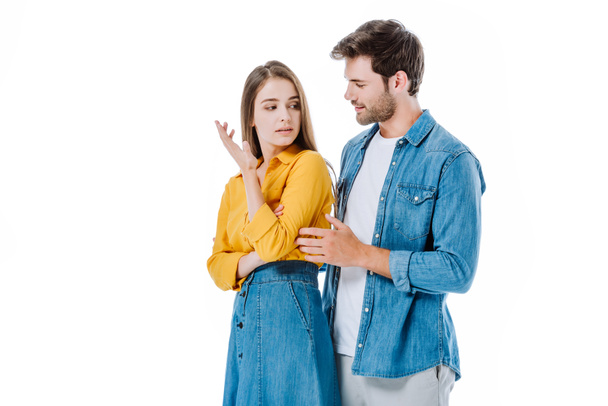 young couple in denim quarreling isolated on white - Фото, зображення