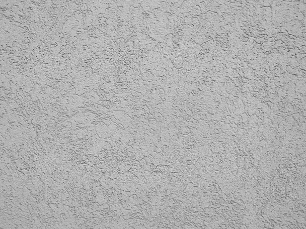 effen wit grijs muurgebouw met zichtbare textuur van een buiten- of binnenwand voor koel blank behang of achtergrond - Foto, afbeelding