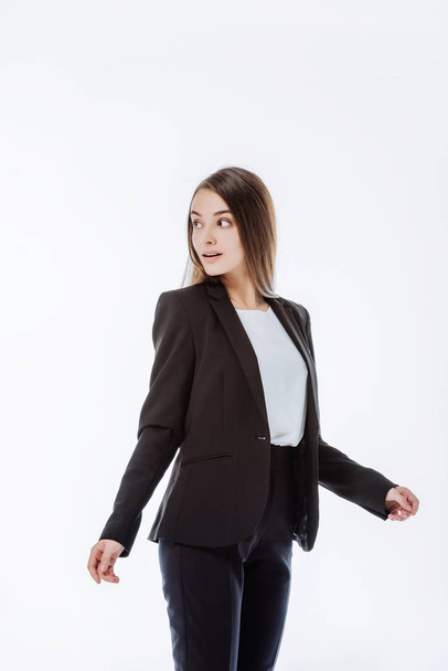 confident businesswoman in suit looking away isolated on white - Fotografie, Obrázek