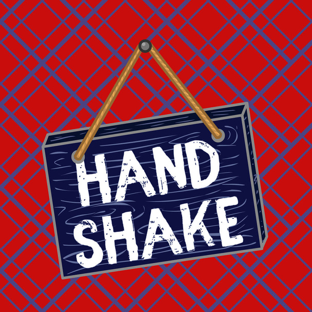 Escrevendo um bilhete mostrando Hand Shake. Foto de negócios mostrando um ato mostrando que você fez um acordo ou saudação Quadrado retângulo irreal de madeira dos desenhos animados na parede colorida
. - Foto, Imagem