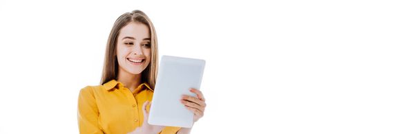 smiling attractive girl using digital tablet isolated on white, panoramic shot - Fotoğraf, Görsel