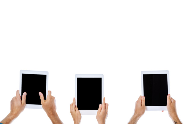 cropped view of young friends holding digital tablets with blank screens isolated on white - Foto, Imagem
