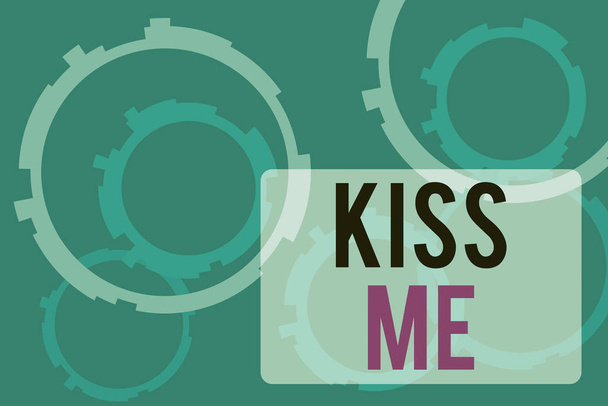Text sign showing Kiss Me. Conceptual photo informally request to touch my lips with your lips or press against Abstract Texture background with gears plain color behind. Gradient Pattern. - Photo, Image