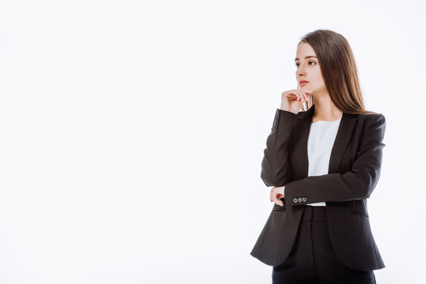 thoughtful businesswoman in suit looking away isolated on white - Φωτογραφία, εικόνα