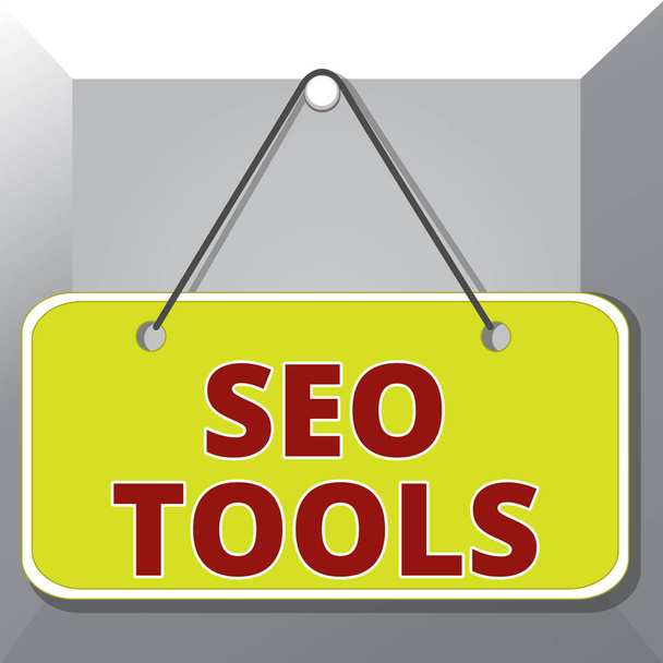 Conceptual hand writing showing Seo Tools. Business photo text process of affecting online visibility of website or page Memo reminder empty board attached background rectangle. - Photo, Image
