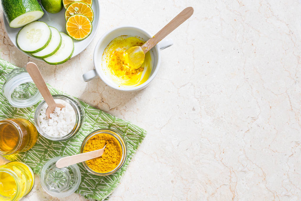 making a home made tumeric face cream - alternative medicine and health care flat lay image - Foto, afbeelding