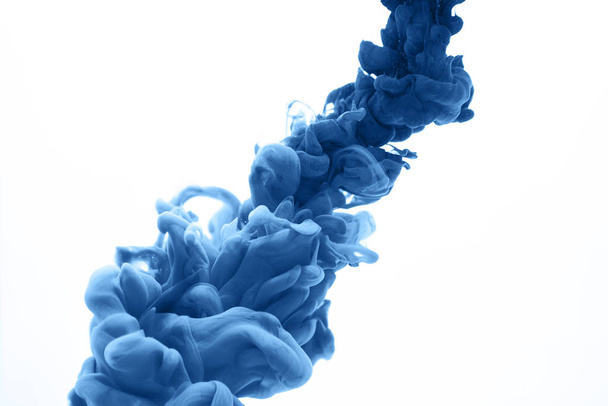 Ink in water in a classic blue color - Fotoğraf, Görsel