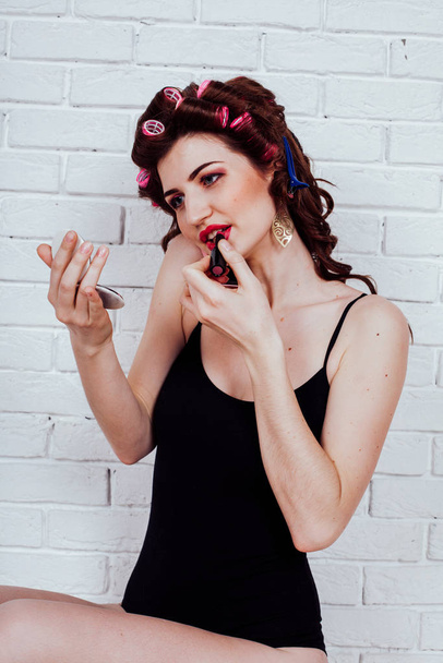 Woman with curlers talking on the phone makeup - Photo, Image