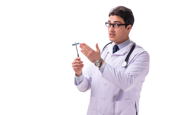 Jonge mannelijke arts neuroloog geïsoleerd op wit - Foto, afbeelding