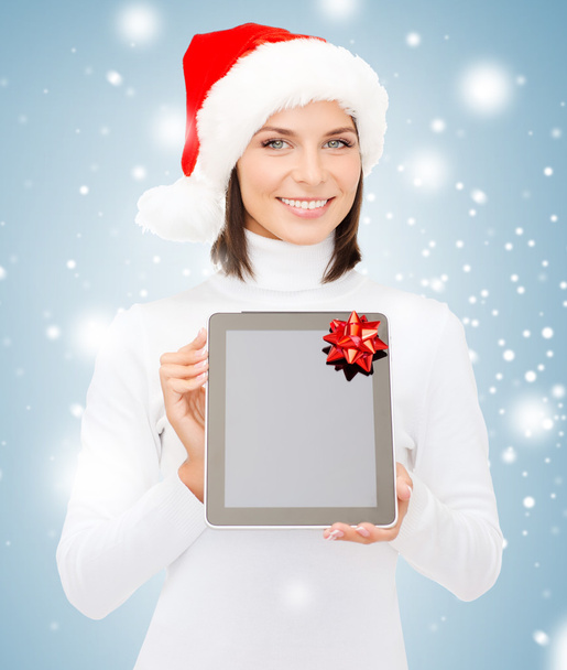 Woman in santa helper hat with tablet pc - Foto, Imagem