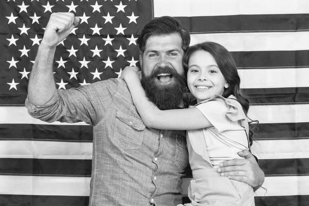 Freedom fundamental right. How do americans celebrate independence day. Father american bearded hipster and cute little daughter with USA flag. Independence is happiness. Independence day holiday - Foto, Bild