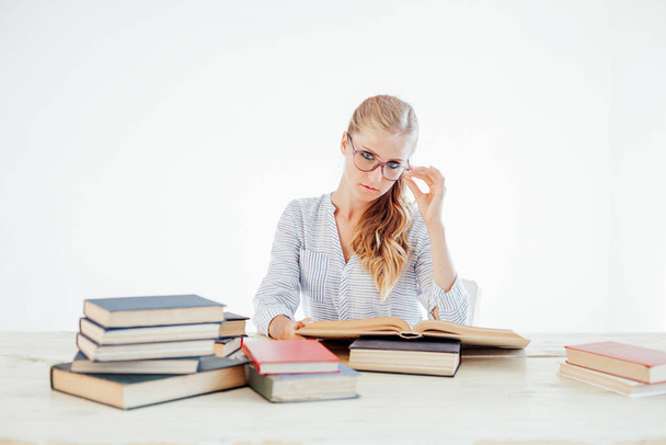 business girl Secretary reads books is preparing for the exam - Фото, изображение