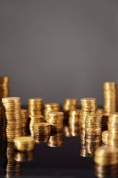 Image of coins stacks. Shallow depth of field - Photo, Image