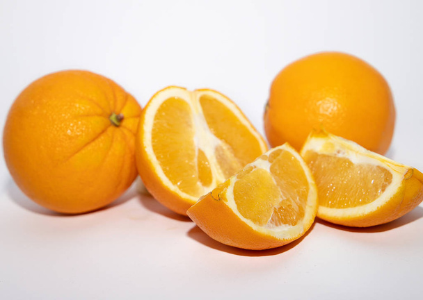 Bright fresh oranges isolated on white background - Photo, Image