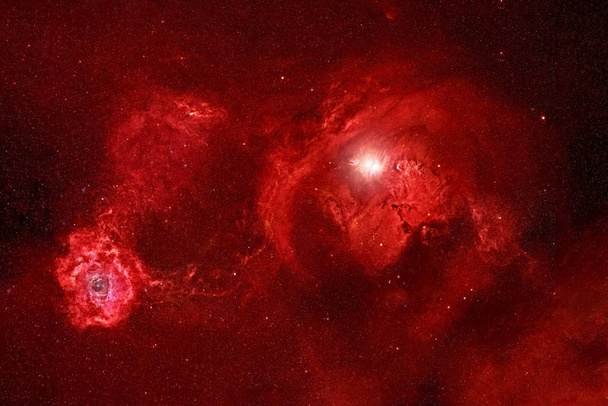 Red nebula in deep space. Elements of this image were furnished by NASA. - Photo, Image