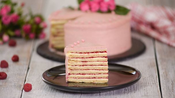 Slice Of Layered Creamy Fruit Cake. Raspberry Layer Cake. - Fotografie, Obrázek
