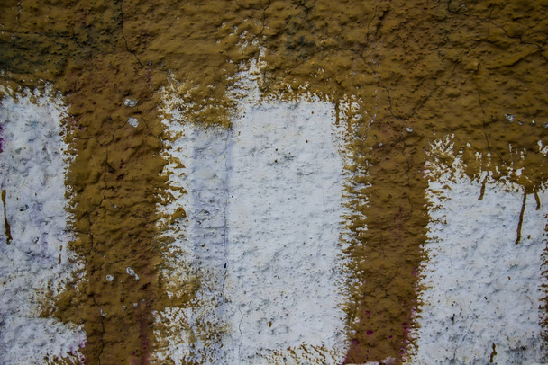 A dirty wall with smudges from paint.  Background texture wall. - Foto, afbeelding