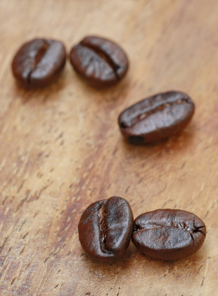 semente de café na mesa de madeira
 - Foto, Imagem