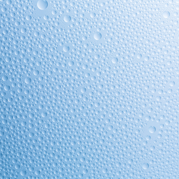 Gotas de agua rebordeando efecto nano tau lotuseffekt sellador azul repele deflector de lluvia
 - Foto, Imagen