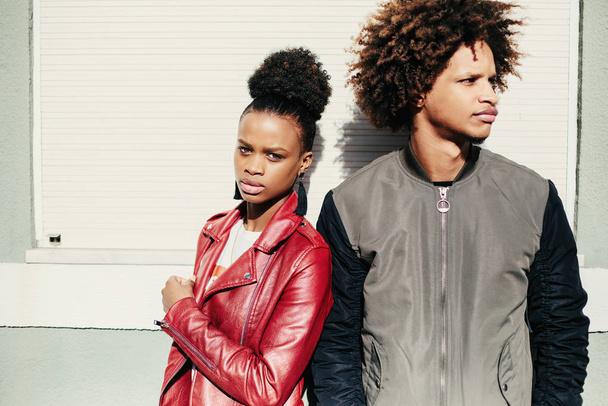 Young black teen couple. Dark skin, mixed race, voluminous african hair - 写真・画像