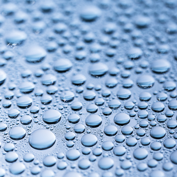 gotas de água beading nano efeito tau lotuseffekt azul selante repele defletor de chuva
 - Foto, Imagem