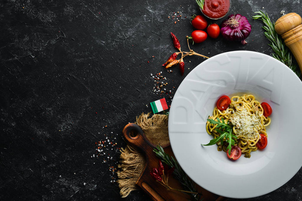 Italian traditional pasta with tuna and cherry tomatoes. Top view. Free copy space. - Fotoğraf, Görsel