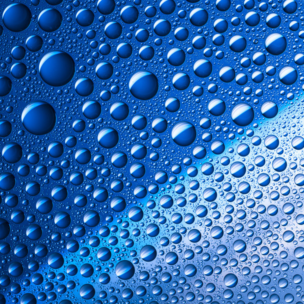 gota de água efeito gota de orvalho efeito nano lotuseffekt impregnação azul repele defletor de chuva
 - Foto, Imagem