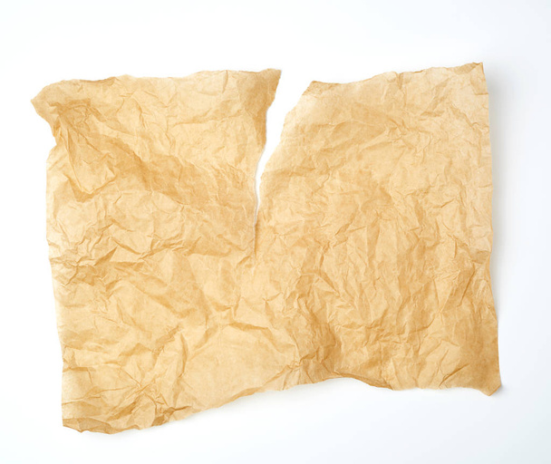 roztrhaný kus hnědého pergamenového papíru  - Fotografie, Obrázek