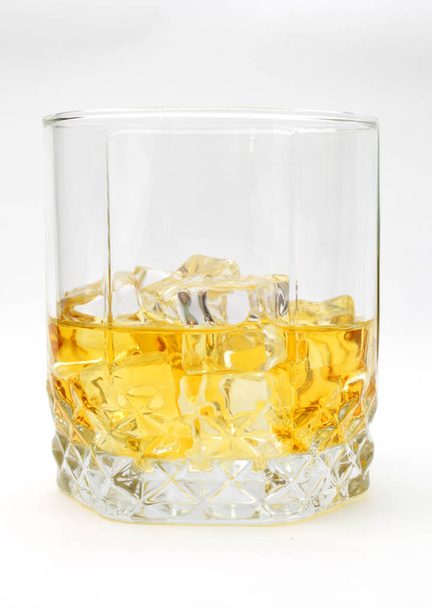 rum with ice on a white background close-up, isolate - 写真・画像