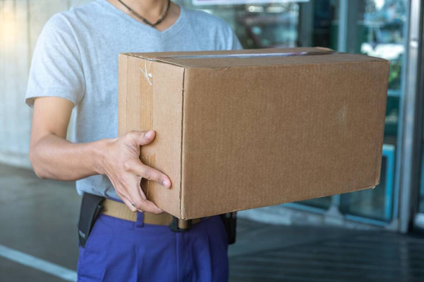 Delivery man deliver parcels. - 写真・画像