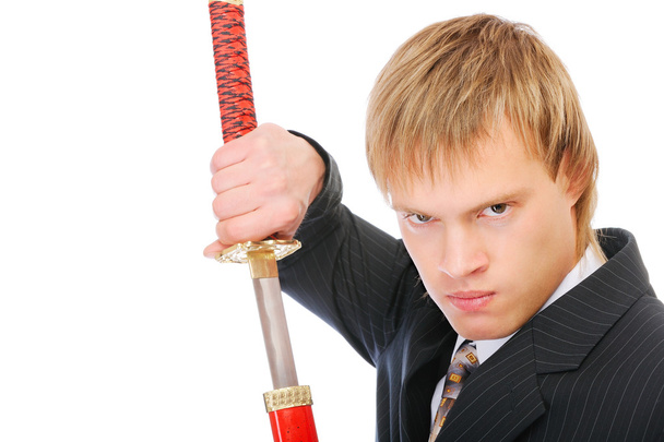 Man with sword protects business - Valokuva, kuva