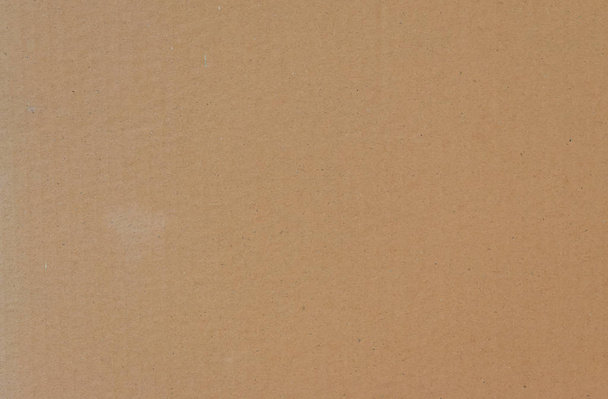 Fondo de textura de papel marrón viejo o superficie de cartón de una caja de papel
. - Foto, imagen