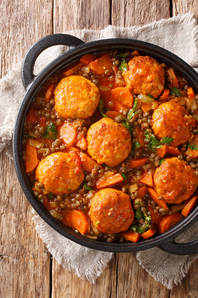 Delicious meatballs stewed with lentils and vegetables close-up  - Photo, Image