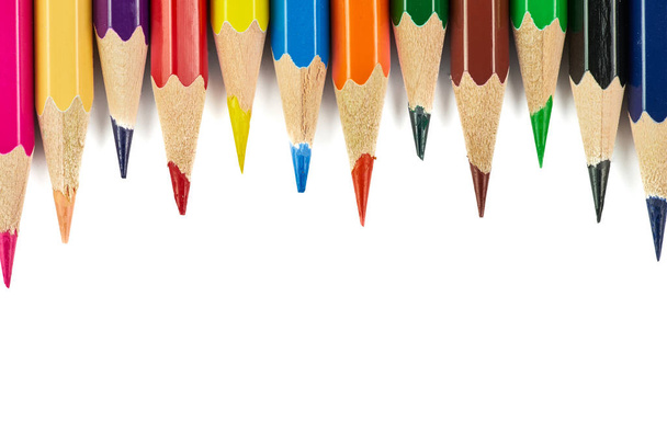 Colored pencils background. Color pencils on white background. Isolated - Фото, изображение