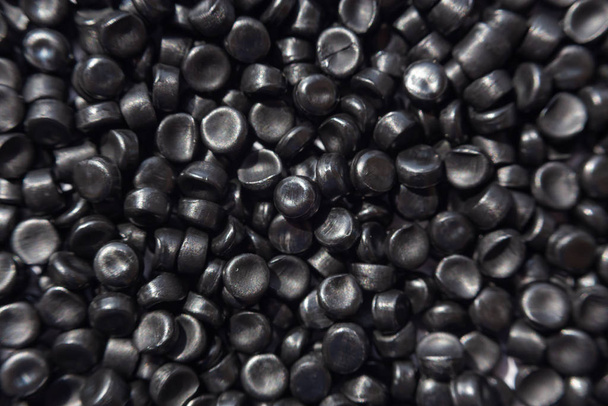 Close-up of plastic polymer granules. hand hold Polymer pellets. - Photo, Image