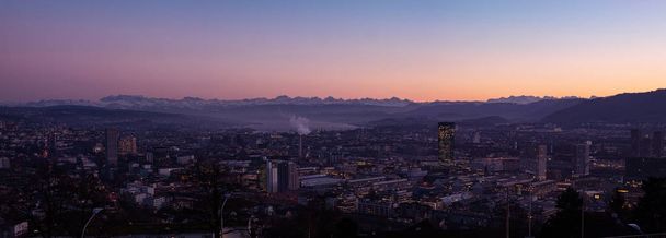 Beautiful panoramic vista view at dusk of Zurich city Switzerlan - Photo, Image