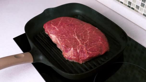 Raw Beef Steak Roasting on Grill Pan and Drizzling by Olive Oil - Filmati, video