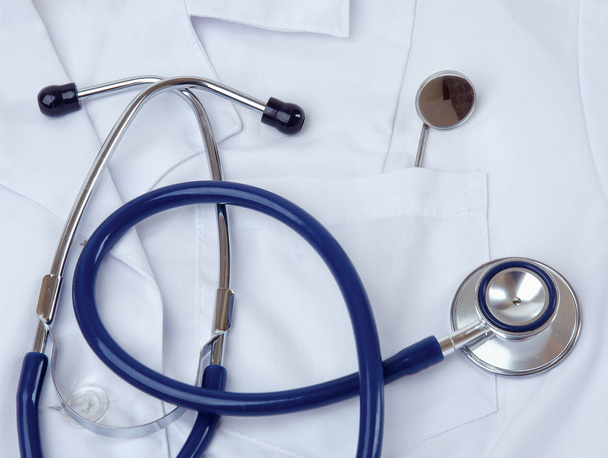 Doctor coat with stethoscope - Foto, imagen