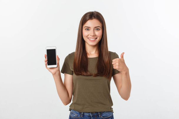 Lány gazdaság Smart Phone - Gyönyörű mosolygós lány kezében egy okos telefon - Fotó, kép